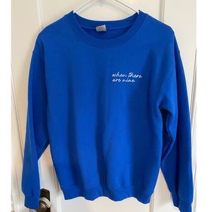 “When There Are Nine” embroidered sweatshirt